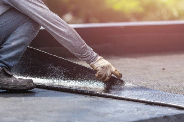 Professional Waterproofing technician working in Wyandotte, MI